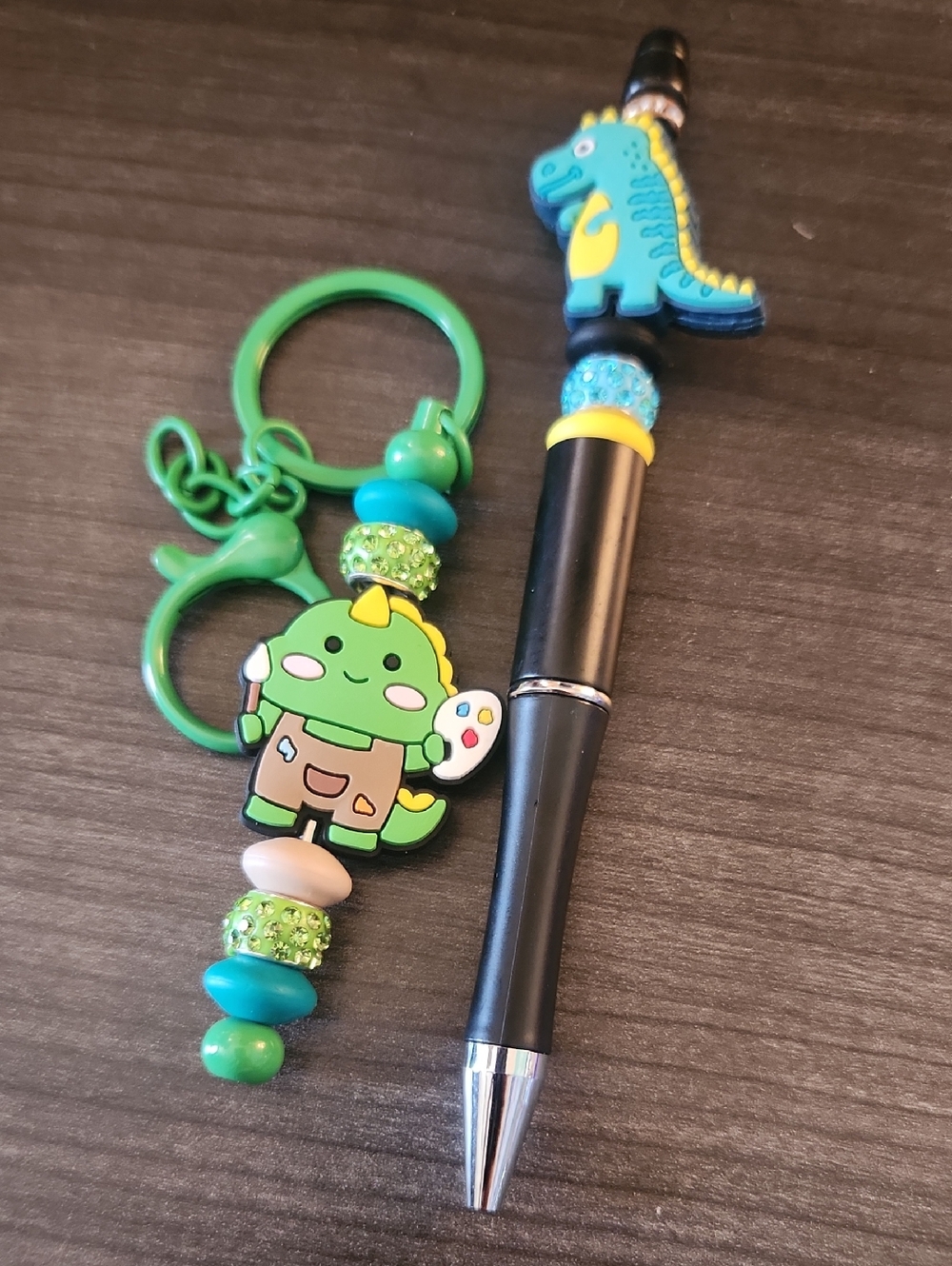 Blue Dinosaur Beaded Pen and Green Artist Dinosaur Keychain